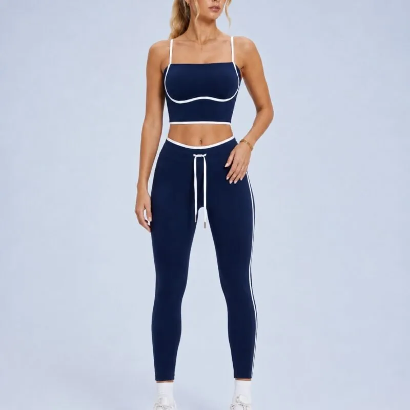 Navy contrast piping crop top and leggings set — front view in hero color