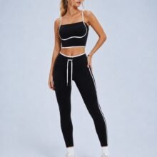Navy contrast piping crop top and leggings set — front view with white U-curve piping detail