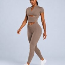 Zip-front cutout crop top with V-waist pocket leggings — black training set