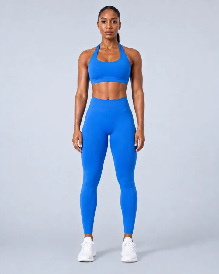 Royal blue seamless halter training top and high-waist leggings set — front view