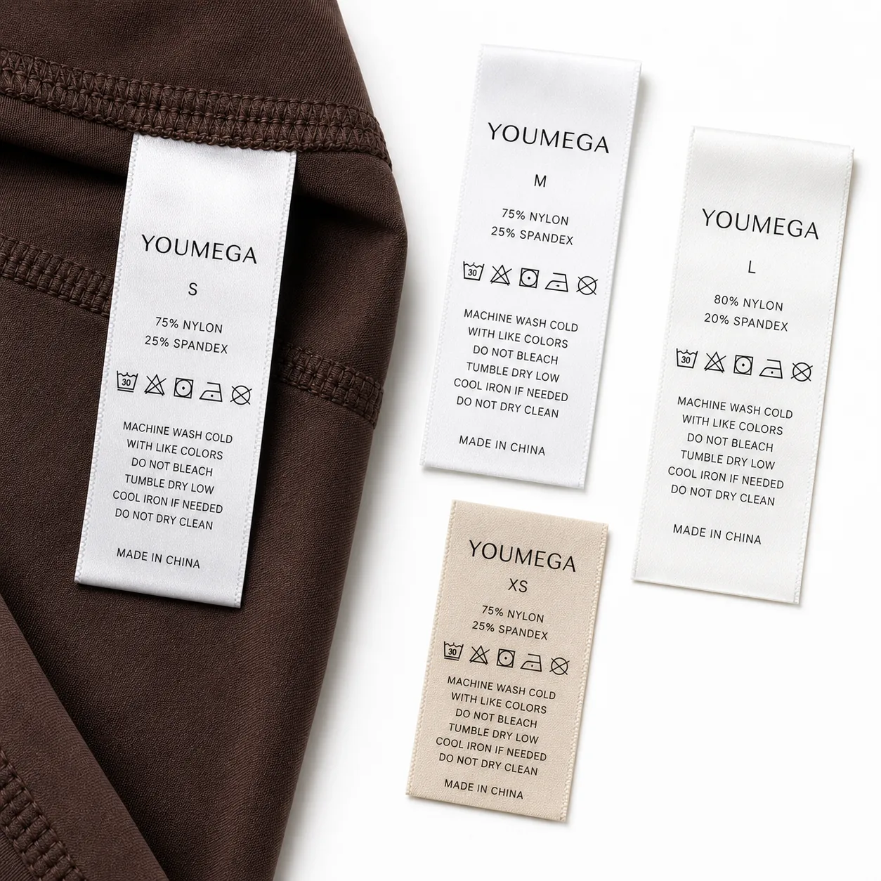 YOUMEGA activewear care and content labels with fiber composition and wash instructions