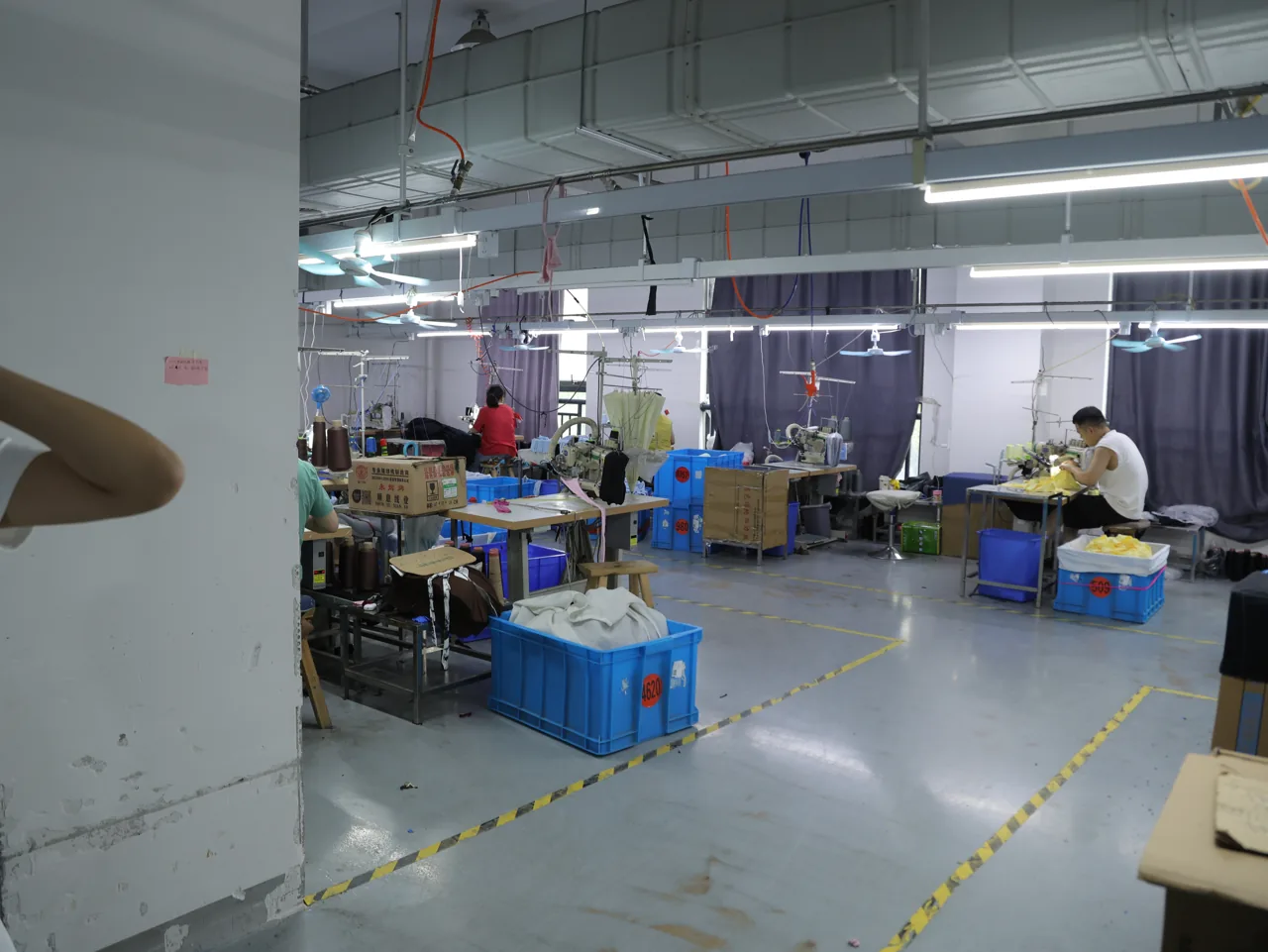 Cut-and-sew activewear sewing line at the YOUMEGA Xiamen factory
