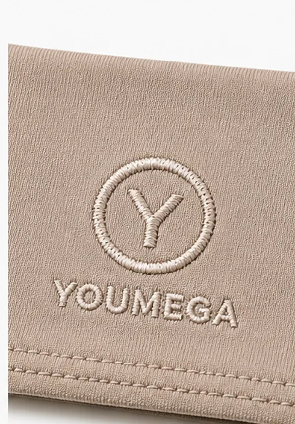 Embroidered YOUMEGA logo on activewear fabric