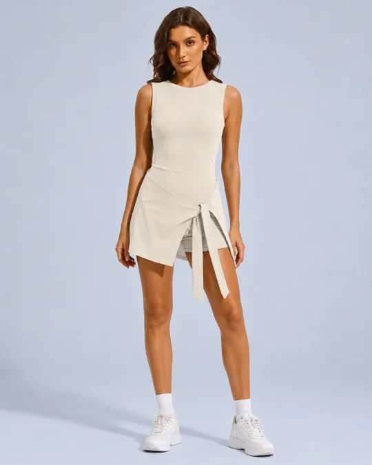 Sleeveless Tennis Dress with Built-In Shorts & Tie Wrap in Ivory - YOUMEGA private label activewear